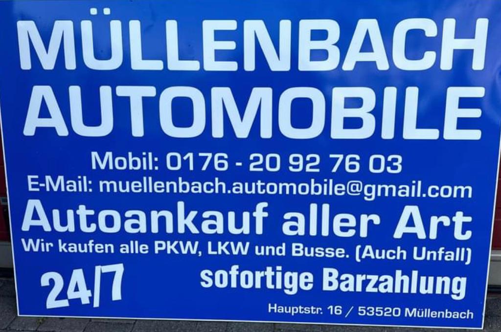 Eigenes Hinweisschild von Müllenbach Automobile an der Hauptstraße